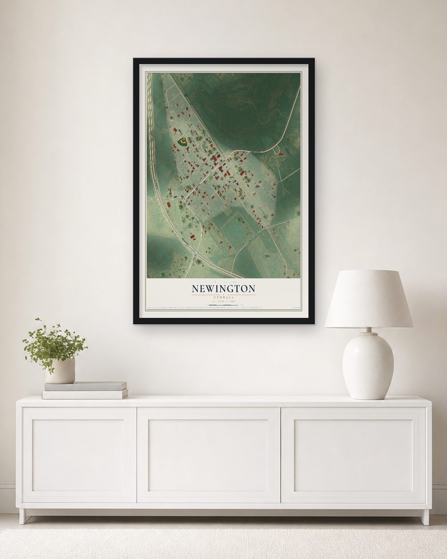 The Newington, Georgia map, 24 x 36 in, in a black wood frame on a living room wall