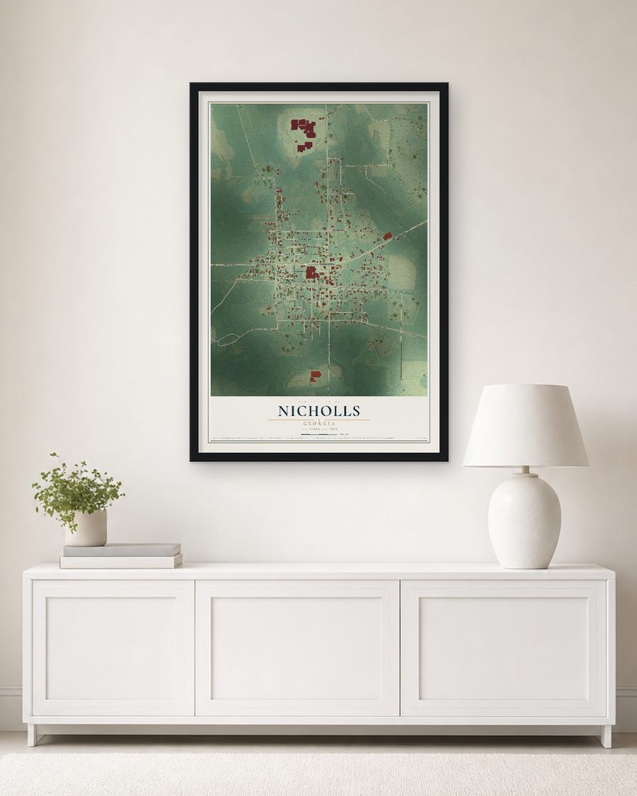 The Nicholls, Georgia map, 24 x 36 in, in a black wood frame on a living room wall