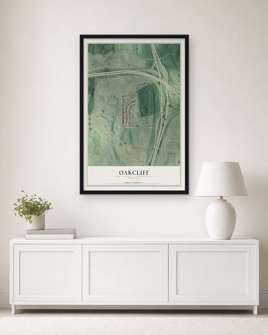 The Oakcliff, Georgia map, 24 x 36 in, in a black wood frame on a living room wall