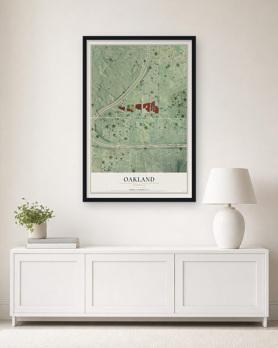The Oakland, Georgia map, 24 x 36 in, in a black wood frame on a living room wall