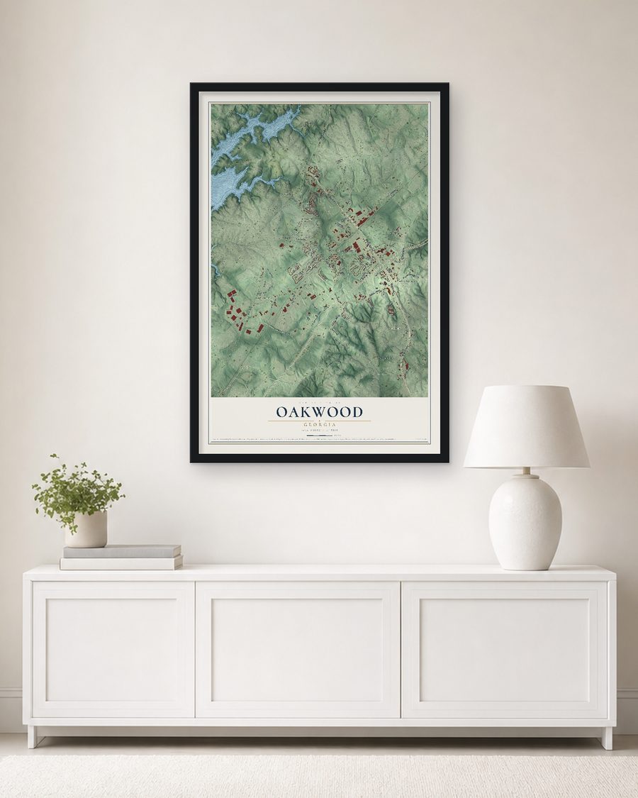 The Oakwood, Georgia map, 24 x 36 in, in a black wood frame on a living room wall