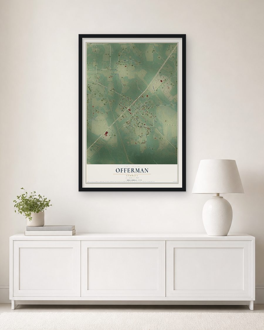 The Offerman, Georgia map, 24 x 36 in, in a black wood frame on a living room wall