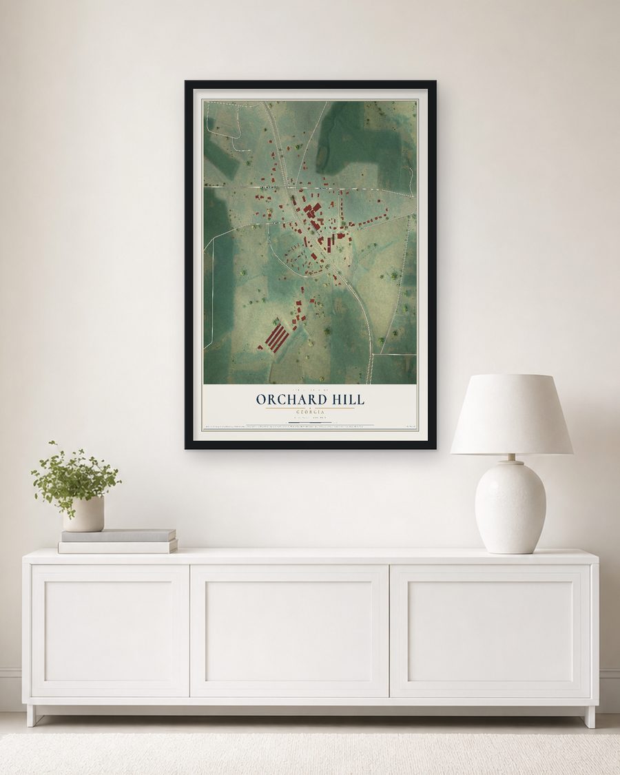 The Orchard Hill, Georgia map, 24 x 36 in, in a black wood frame on a living room wall