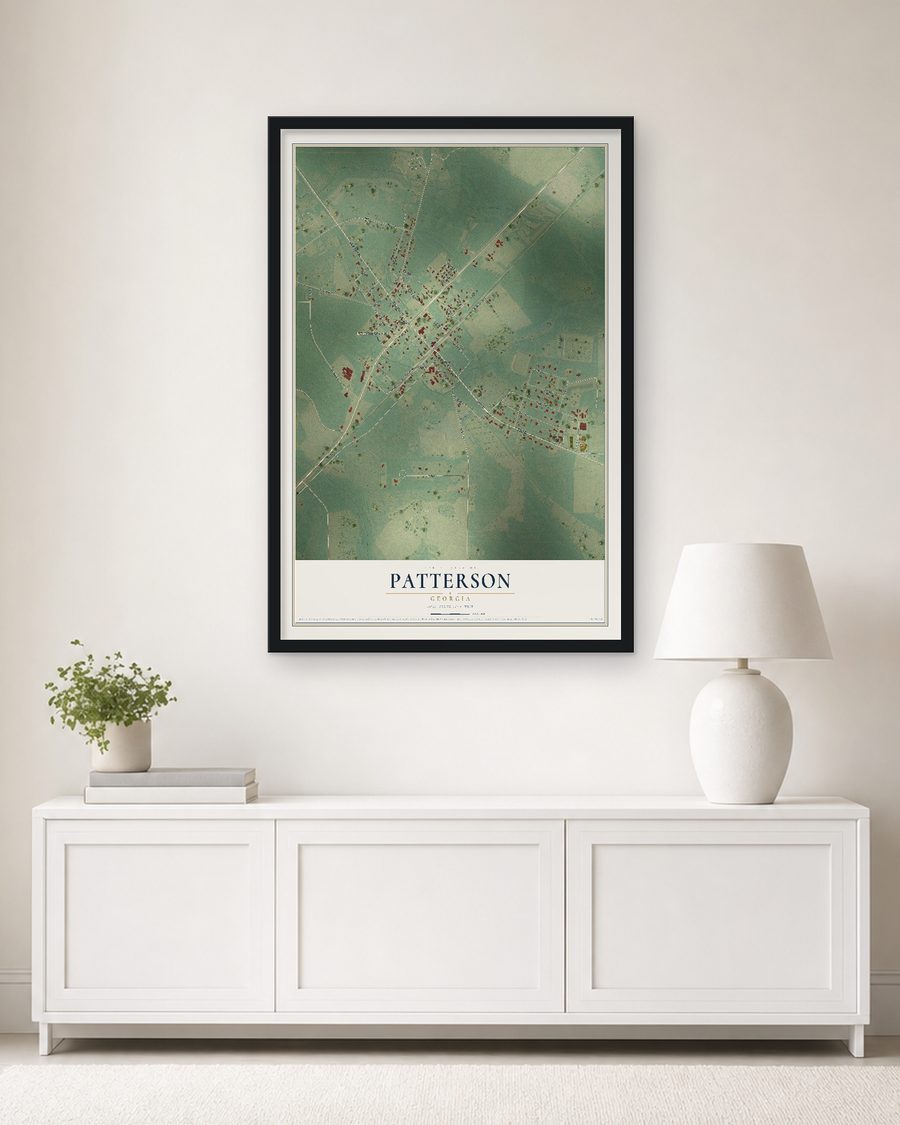 The Patterson, Georgia map, 24 x 36 in, in a black wood frame on a living room wall