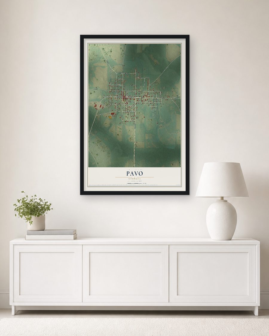 The Pavo, Georgia map, 24 x 36 in, in a black wood frame on a living room wall