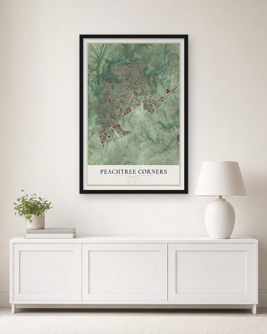 The Peachtree Corners, Georgia map, 24 x 36 in, in a black wood frame on a living room wall