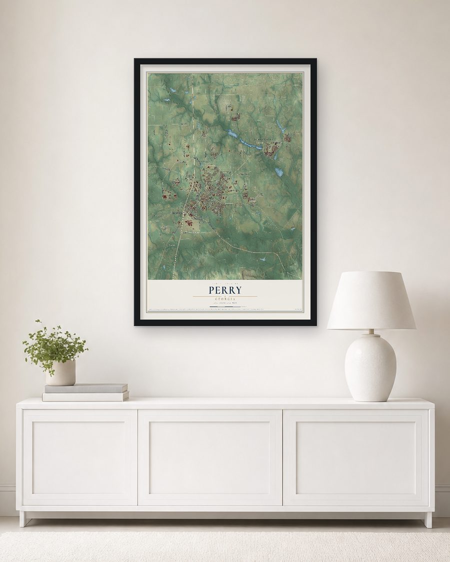 The Perry, Georgia map, 24 x 36 in, in a black wood frame on a living room wall