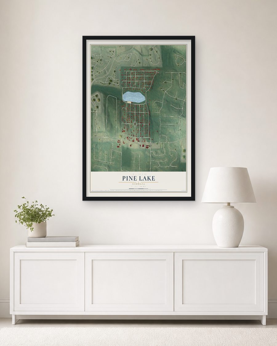 The Pine Lake, Georgia map, 24 x 36 in, in a black wood frame on a living room wall
