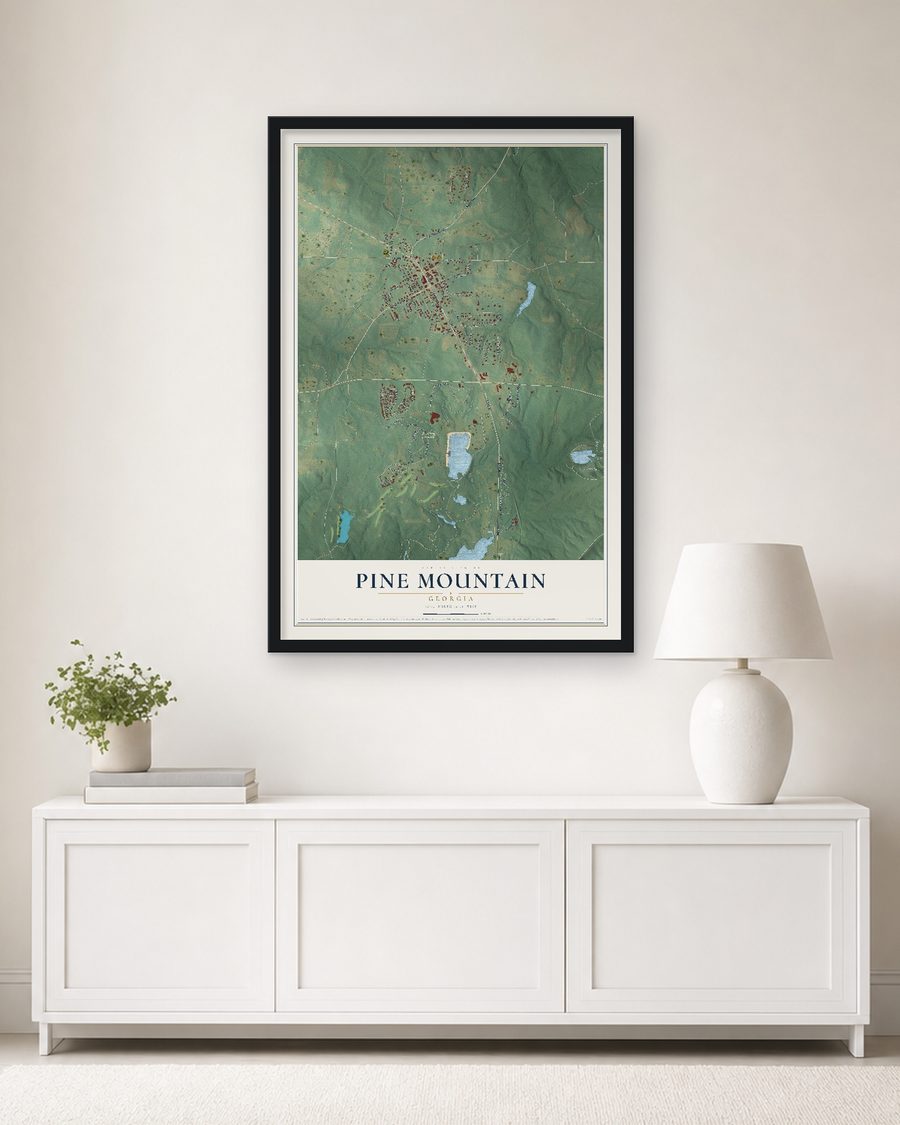 The Pine Mountain, Georgia map, 24 x 36 in, in a black wood frame on a living room wall