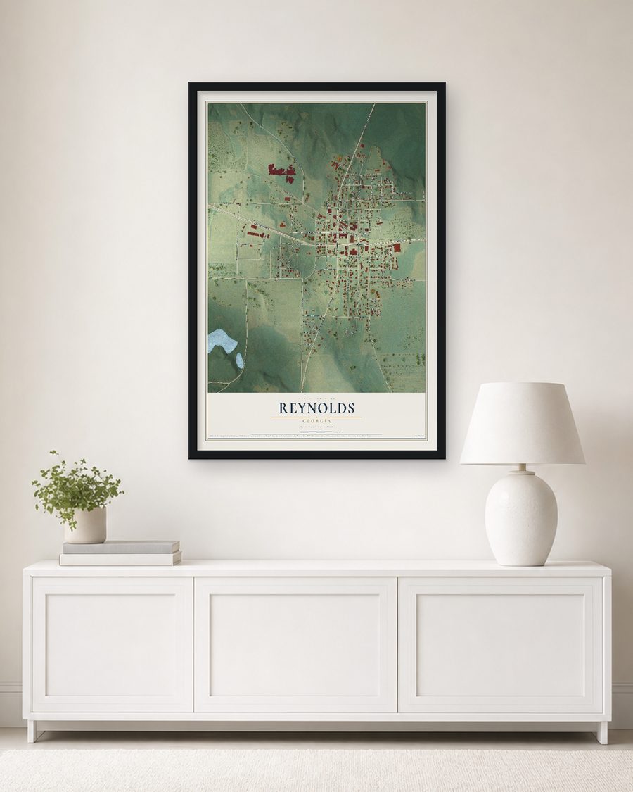 The Reynolds, Georgia map, 24 x 36 in, in a black wood frame on a living room wall