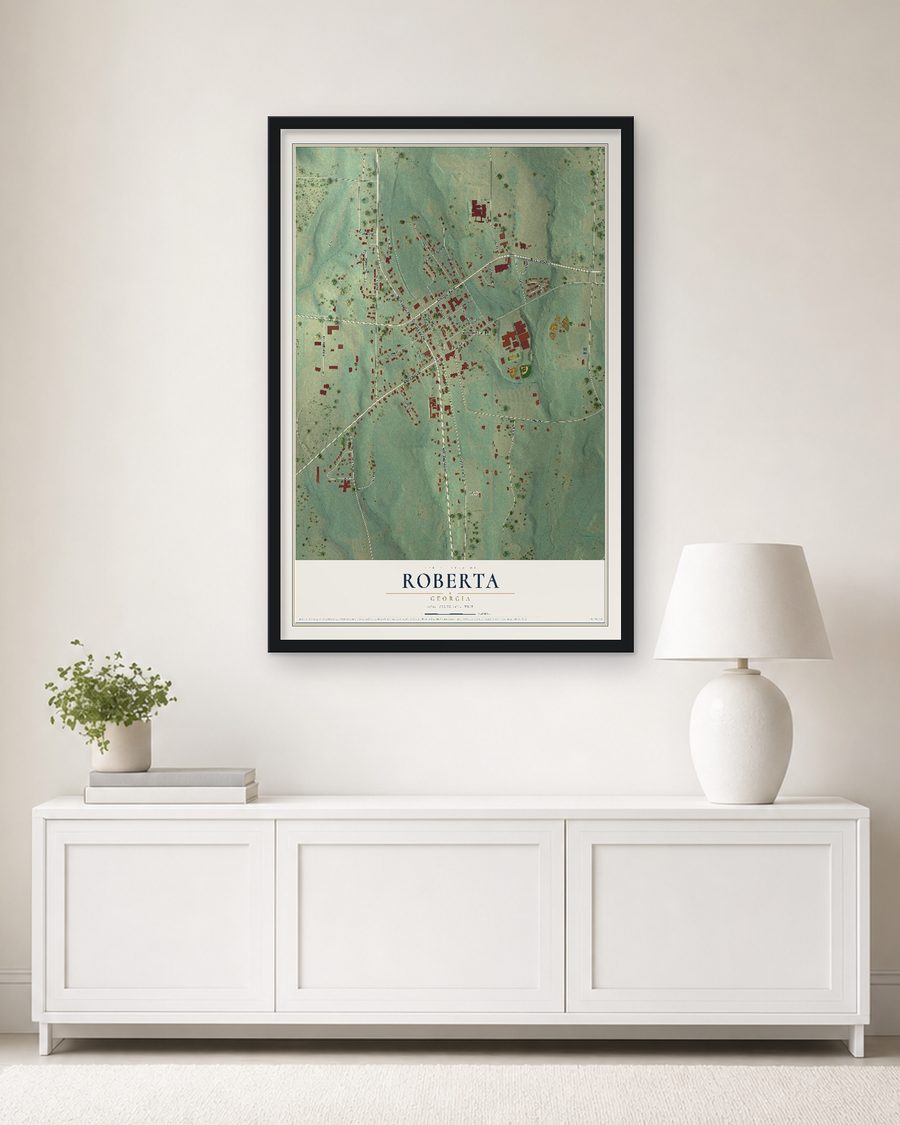The Roberta, Georgia map, 24 x 36 in, in a black wood frame on a living room wall