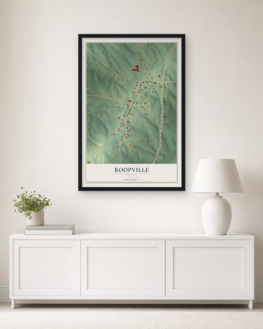 The Roopville, Georgia map, 24 x 36 in, in a black wood frame on a living room wall