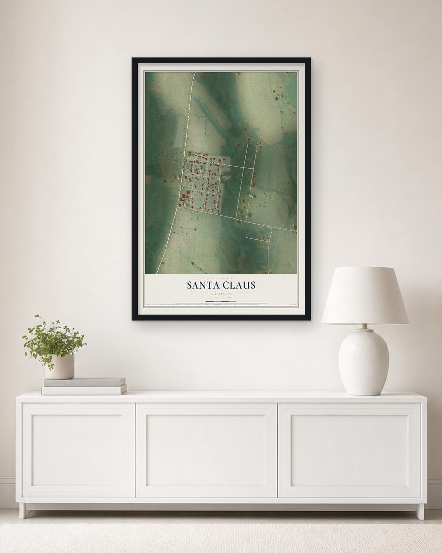 The Santa Claus, Georgia map, 24 x 36 in, in a black wood frame on a living room wall