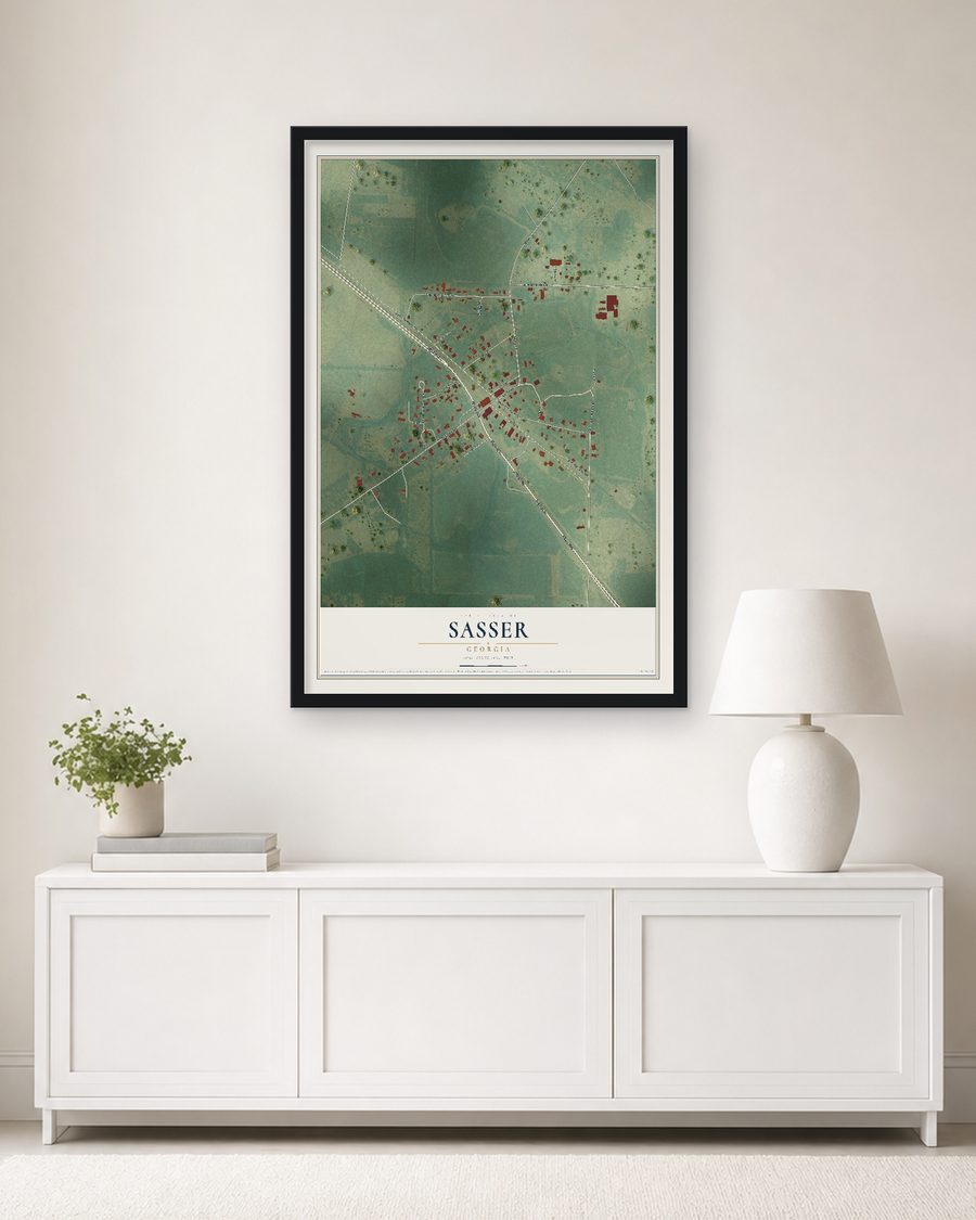 The Sasser, Georgia map, 24 x 36 in, in a black wood frame on a living room wall