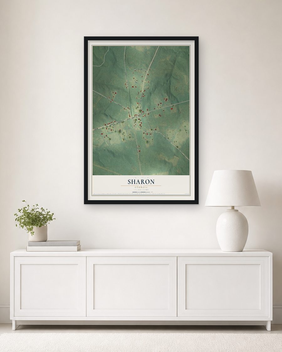 The Sharon, Georgia map, 24 x 36 in, in a black wood frame on a living room wall
