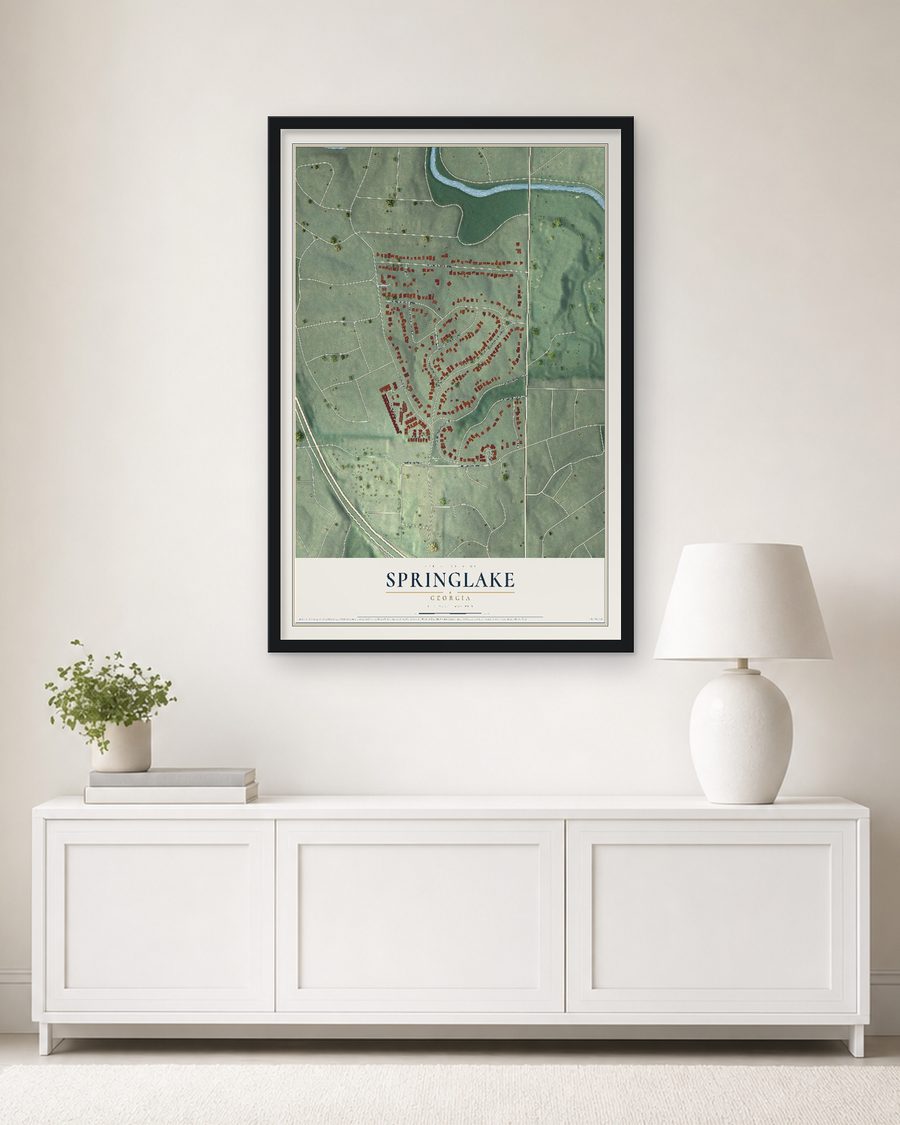 The Springlake, Georgia map, 24 x 36 in, in a black wood frame on a living room wall