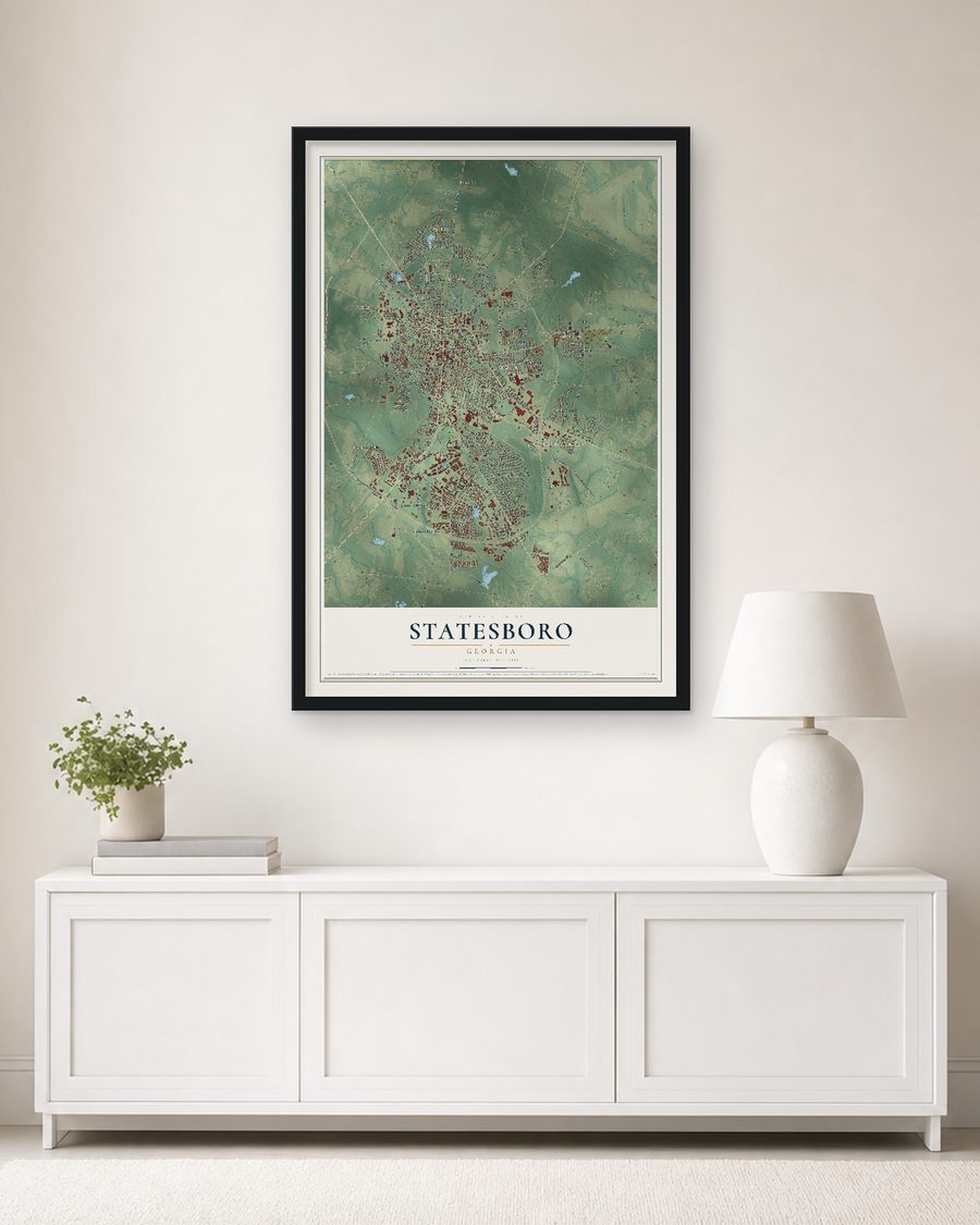 The Statesboro, Georgia map, 24 x 36 in, in a black wood frame on a living room wall