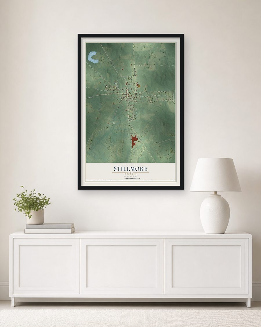 The Stillmore, Georgia map, 24 x 36 in, in a black wood frame on a living room wall
