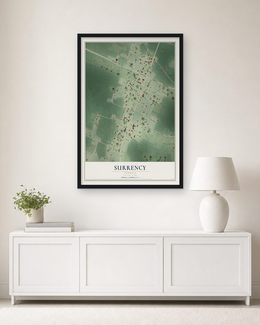 The Surrency, Georgia map, 24 x 36 in, in a black wood frame on a living room wall