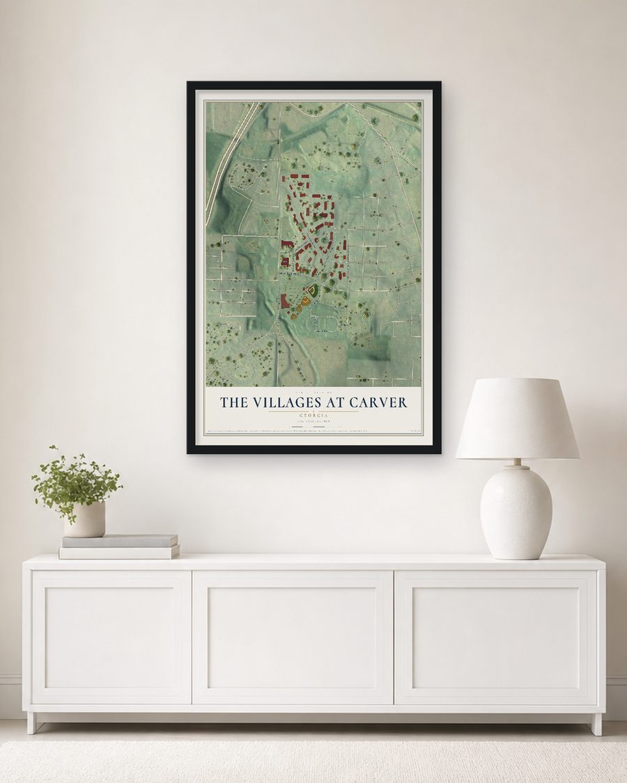 The The Villages at Carver, Georgia map, 24 x 36 in, in a black wood frame on a living room wall