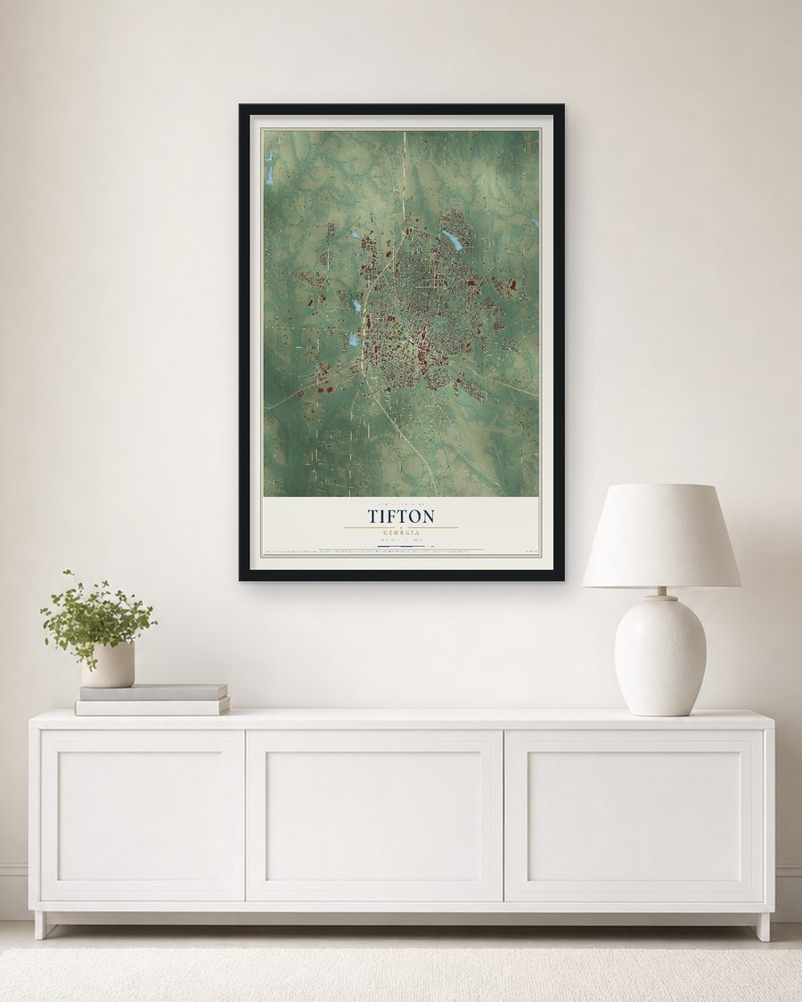 The Tifton, Georgia map, 24 x 36 in, in a black wood frame on a living room wall