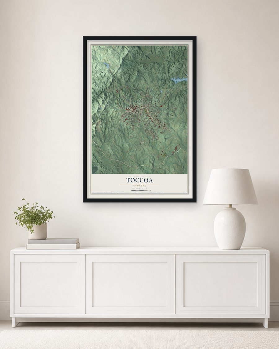 The Toccoa, Georgia map, 24 x 36 in, in a black wood frame on a living room wall