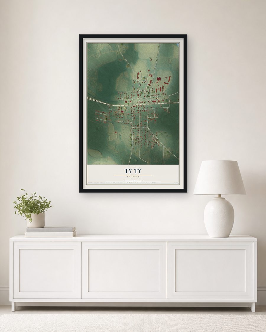The Ty Ty, Georgia map, 24 x 36 in, in a black wood frame on a living room wall