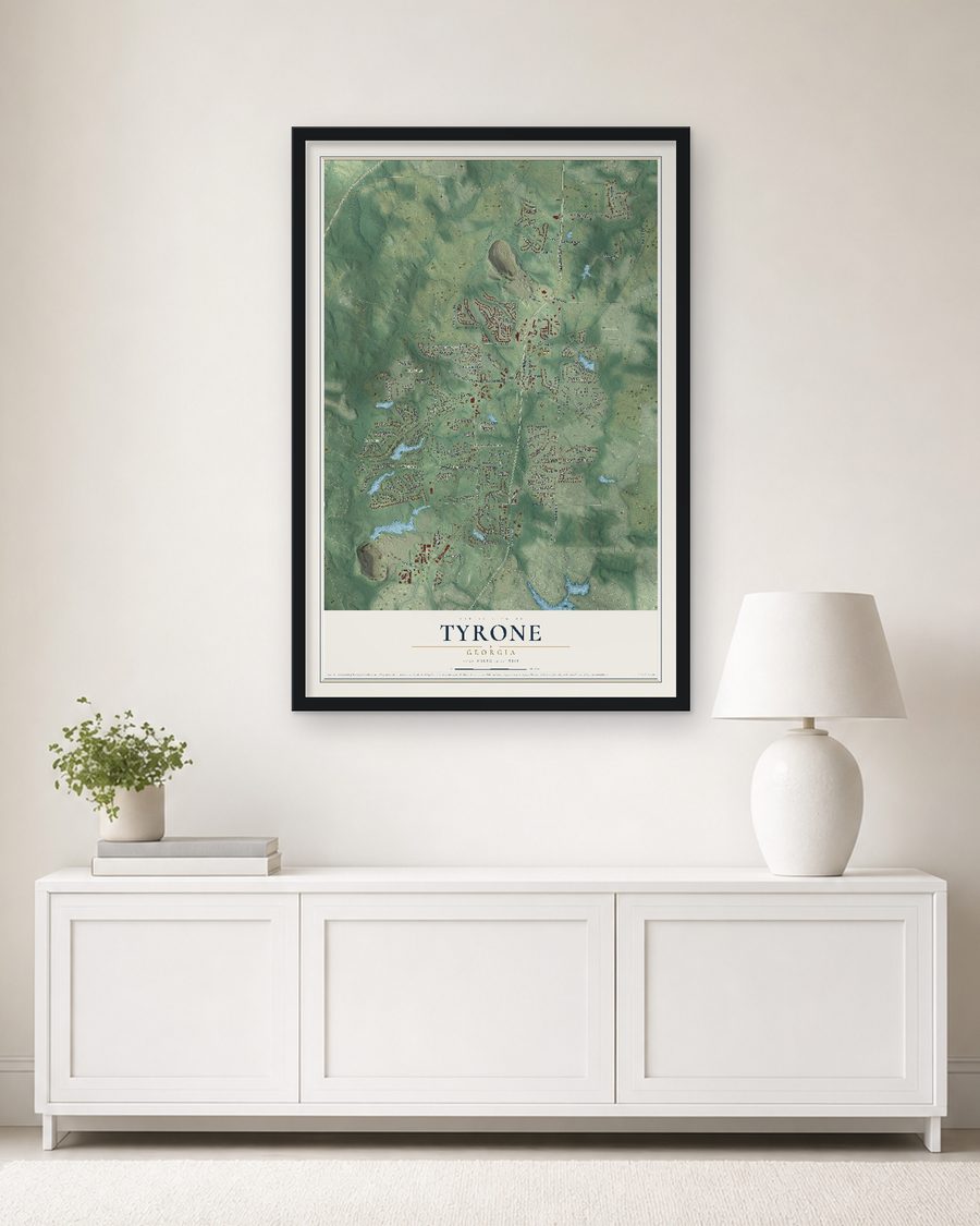 The Tyrone, Georgia map, 24 x 36 in, in a black wood frame on a living room wall
