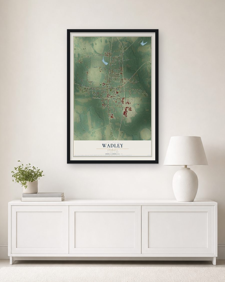 The Wadley, Georgia map, 24 x 36 in, in a black wood frame on a living room wall
