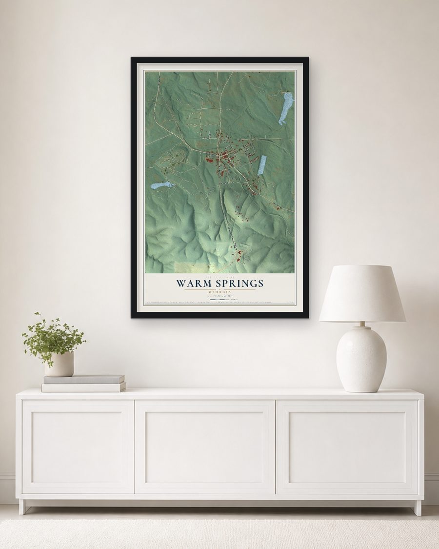 The Warm Springs, Georgia map, 24 x 36 in, in a black wood frame on a living room wall
