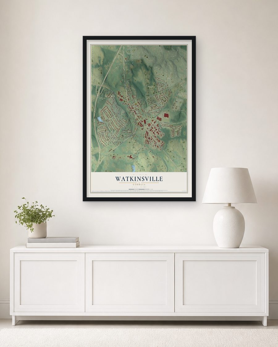 The Watkinsville, Georgia map, 24 x 36 in, in a black wood frame on a living room wall