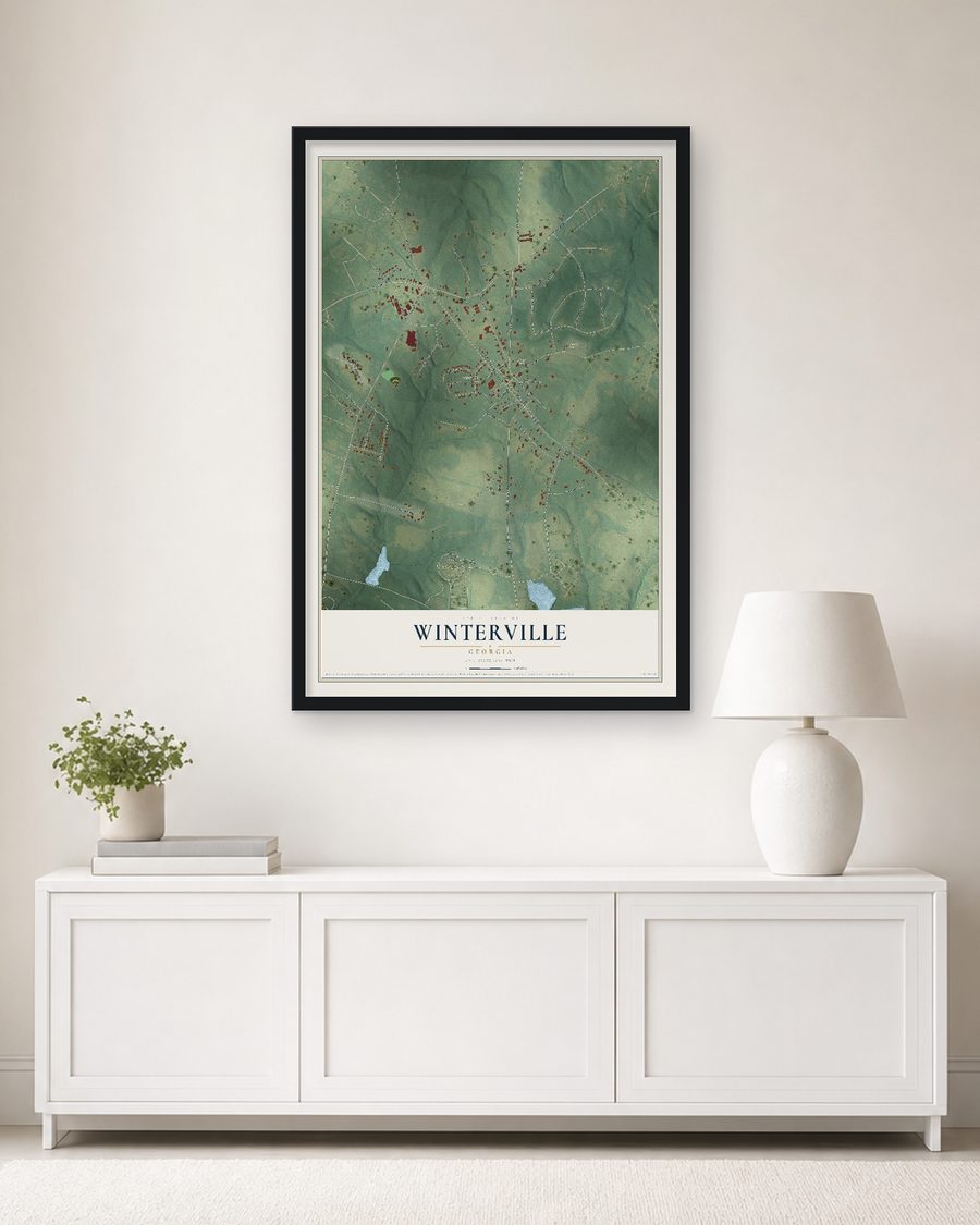 The Winterville, Georgia map, 24 x 36 in, in a black wood frame on a living room wall