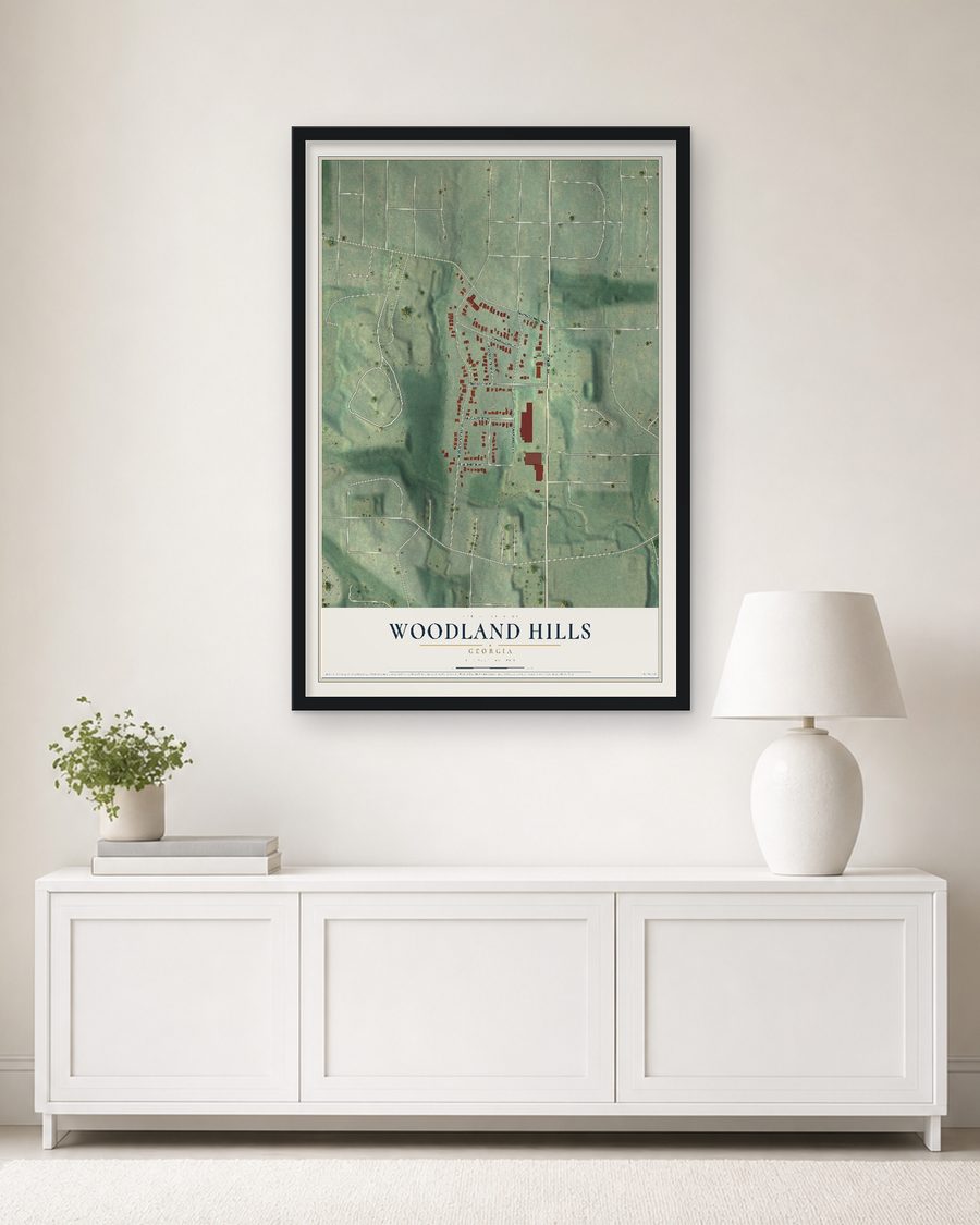 The Woodland Hills, Georgia map, 24 x 36 in, in a black wood frame on a living room wall