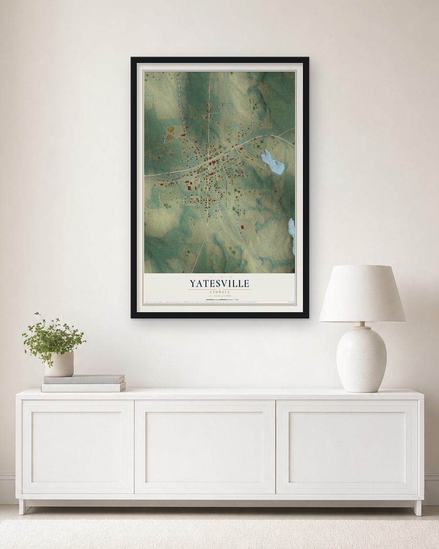 The Yatesville, Georgia map, 24 x 36 in, in a black wood frame on a living room wall