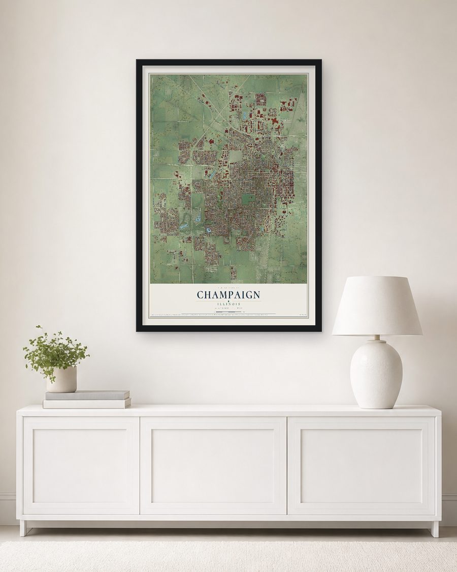 The Champaign, Illinois map, 24 x 36 in, in a black wood frame on a living room wall