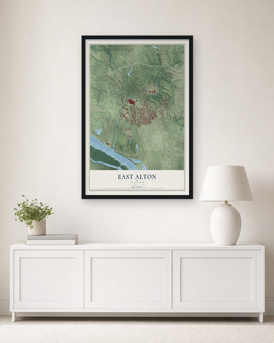 The East Alton, Illinois map, 24 x 36 in, in a black wood frame on a living room wall
