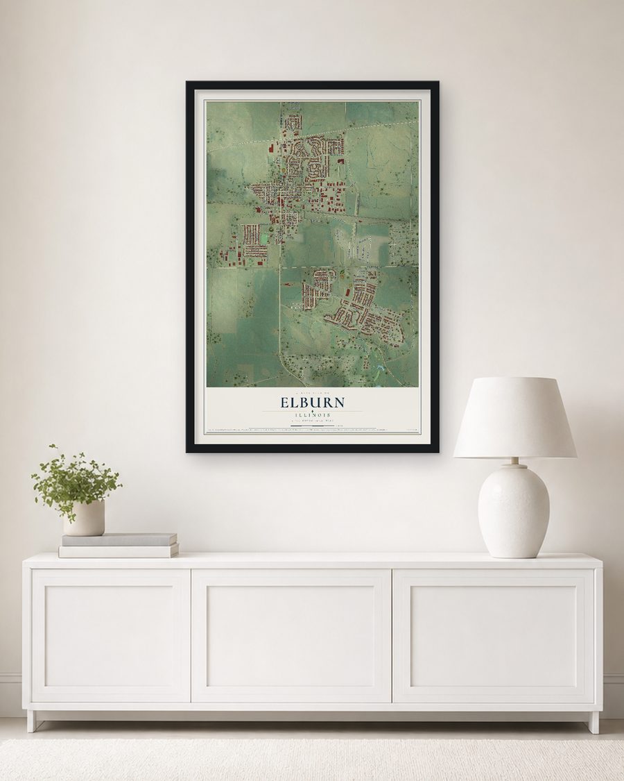 The Elburn, Illinois map, 24 x 36 in, in a black wood frame on a living room wall