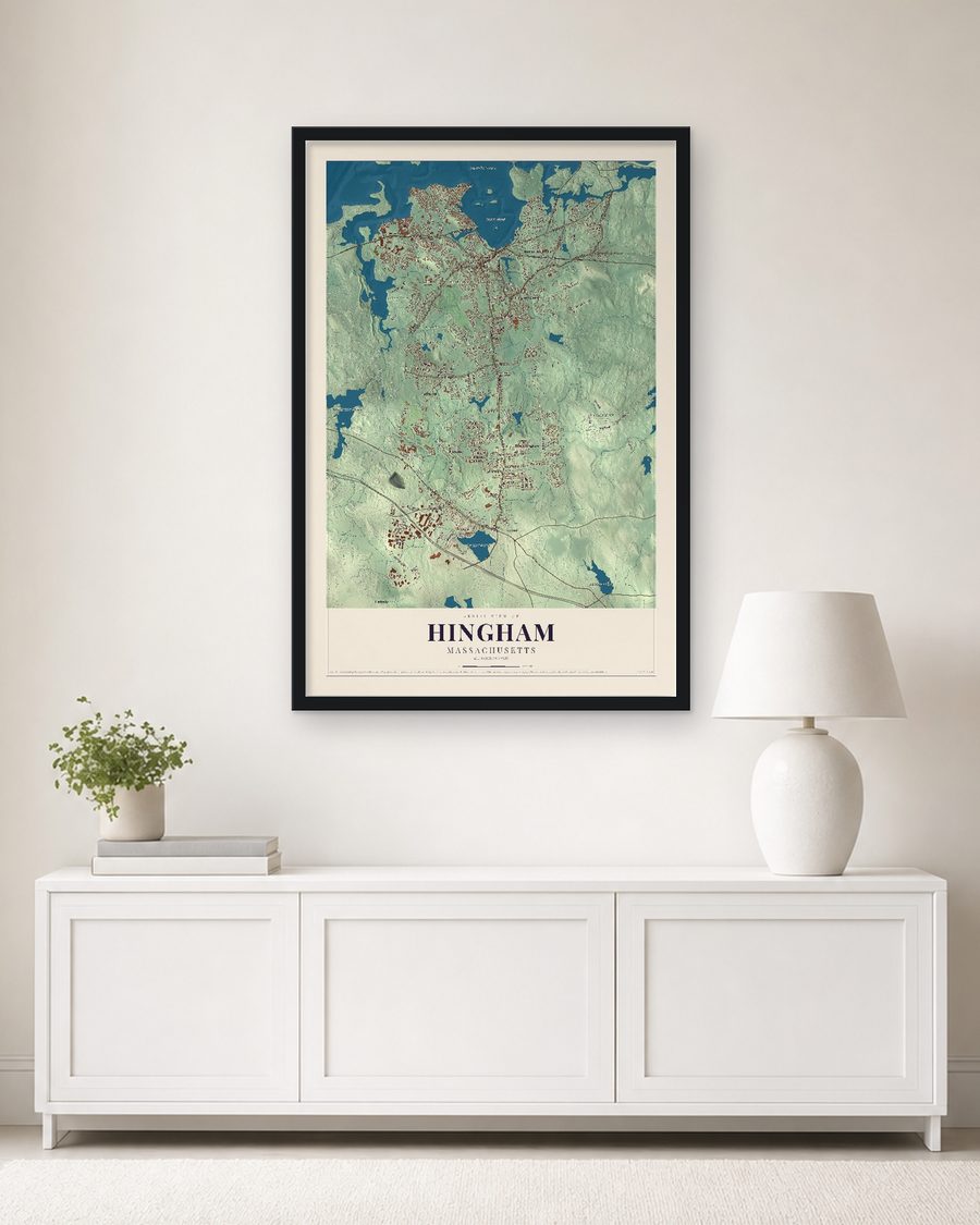 The Hingham, Massachusetts map, 24 x 36 in, in a black wood frame on a living room wall