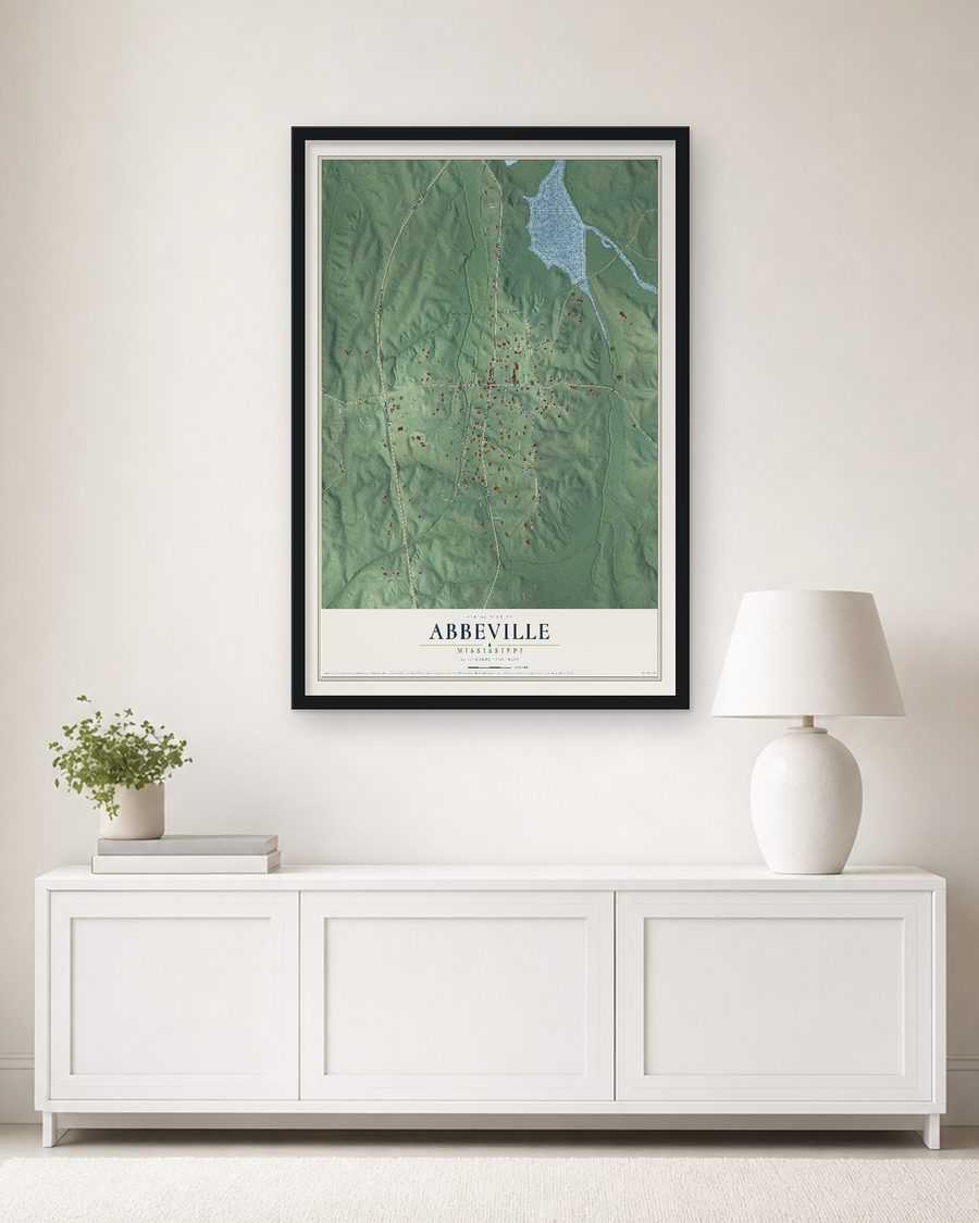 The Abbeville, Mississippi map, 24 x 36 in, in a black wood frame on a living room wall
