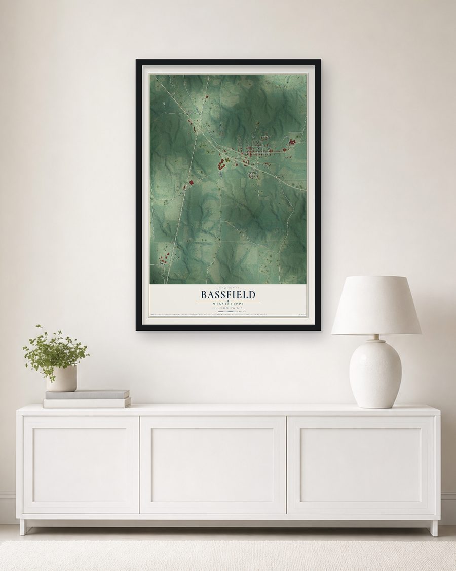 The Bassfield, Mississippi map, 24 x 36 in, in a black wood frame on a living room wall