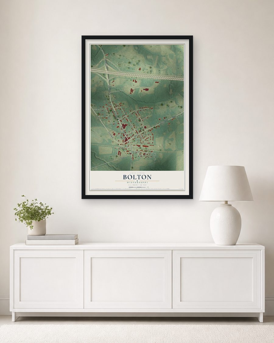 The Bolton, Mississippi map, 24 x 36 in, in a black wood frame on a living room wall