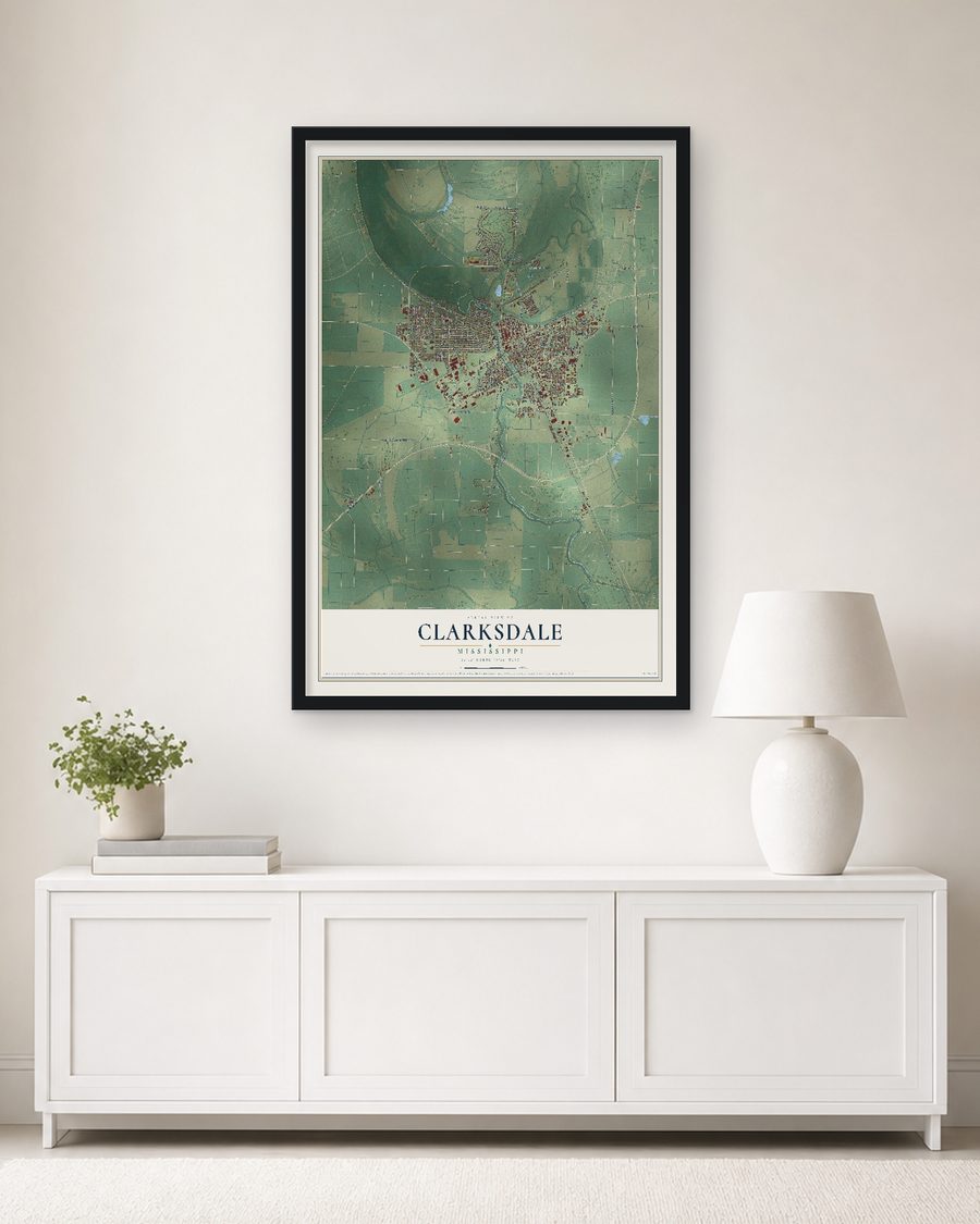 The Clarksdale, Mississippi map, 24 x 36 in, in a black wood frame on a living room wall