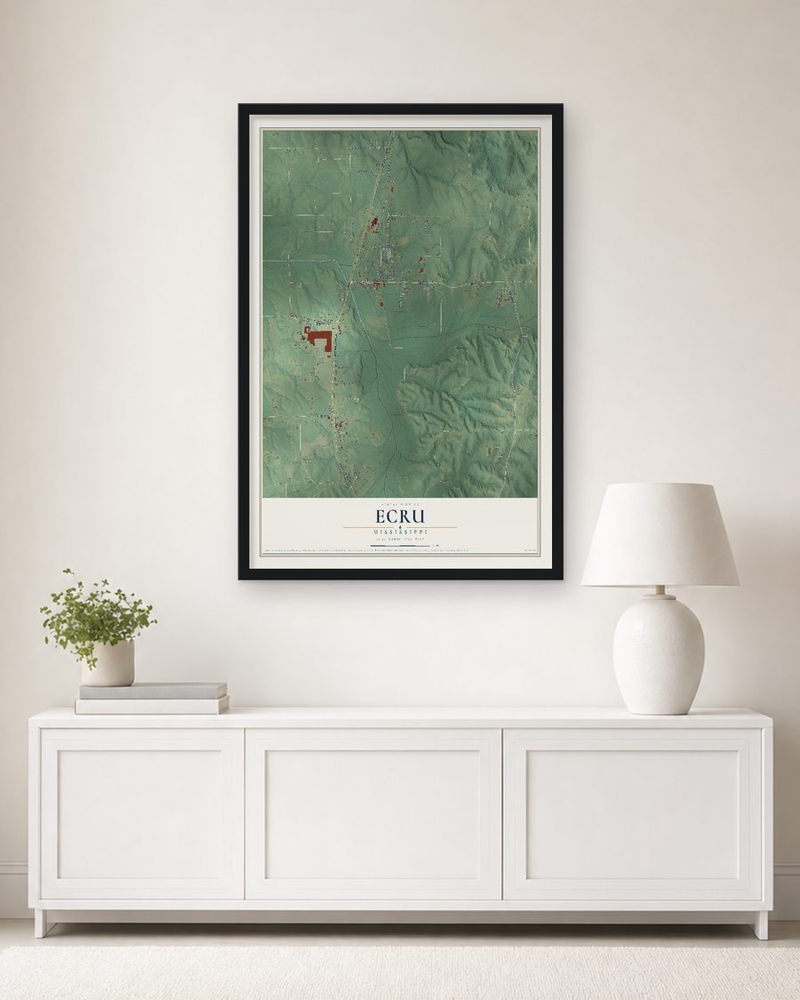 The Ecru, Mississippi map, 24 x 36 in, in a black wood frame on a living room wall