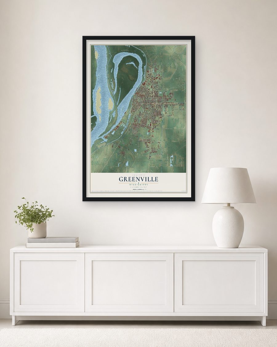 The Greenville, Mississippi map, 24 x 36 in, in a black wood frame on a living room wall