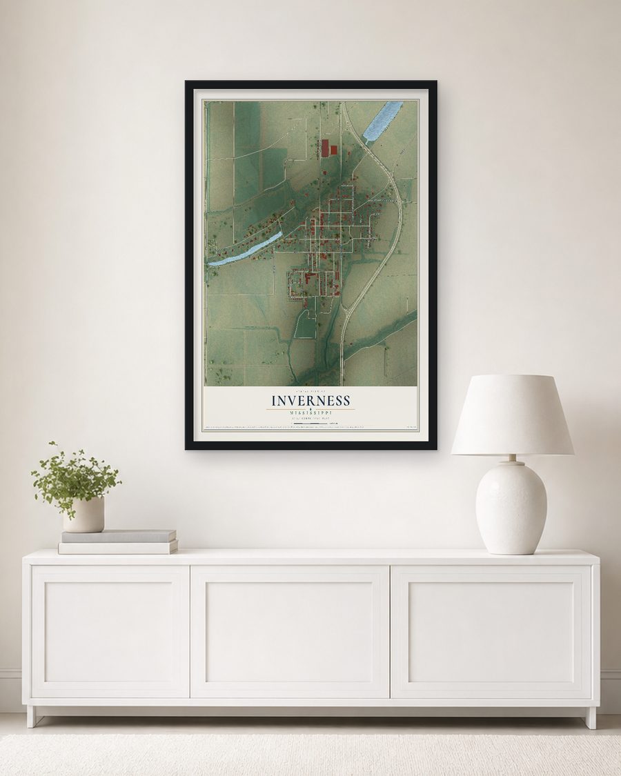 The Inverness, Mississippi map, 24 x 36 in, in a black wood frame on a living room wall