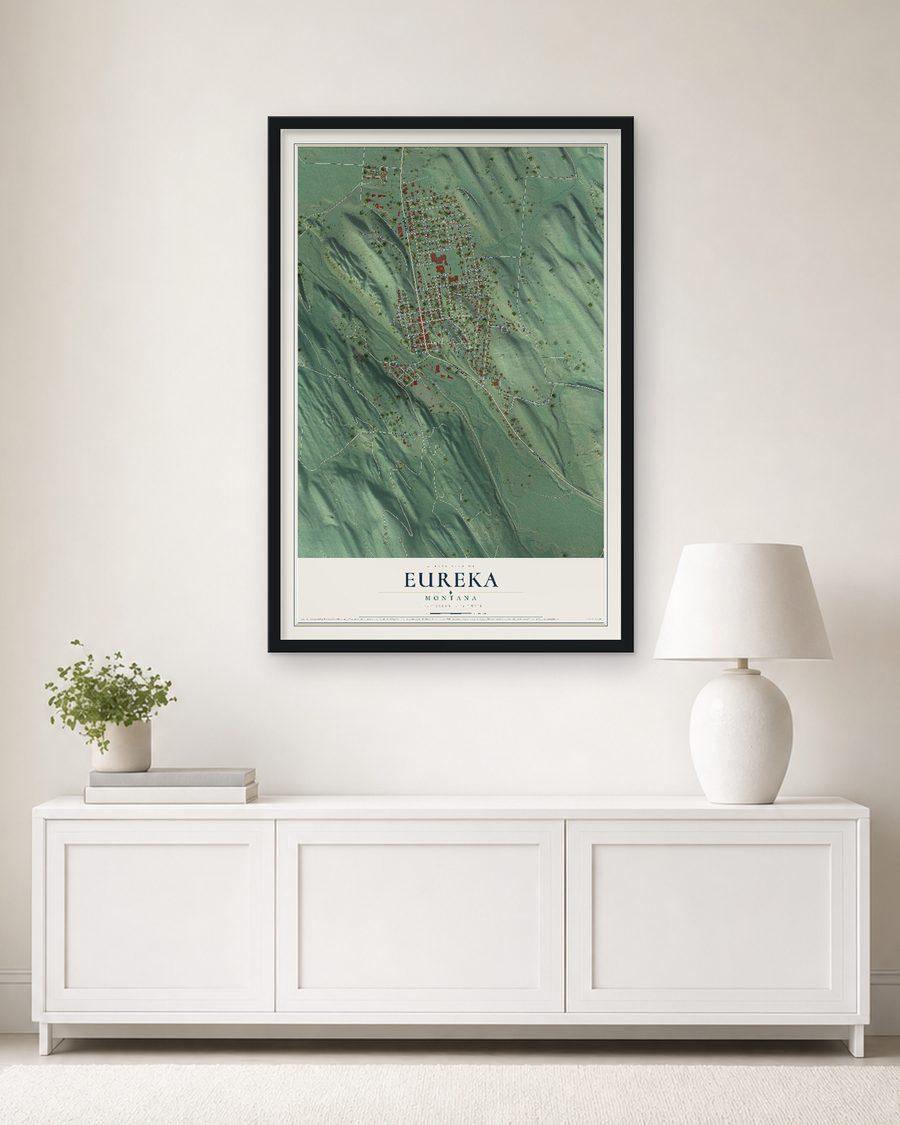 The Eureka, Montana map, 24 x 36 in, in a black wood frame on a living room wall