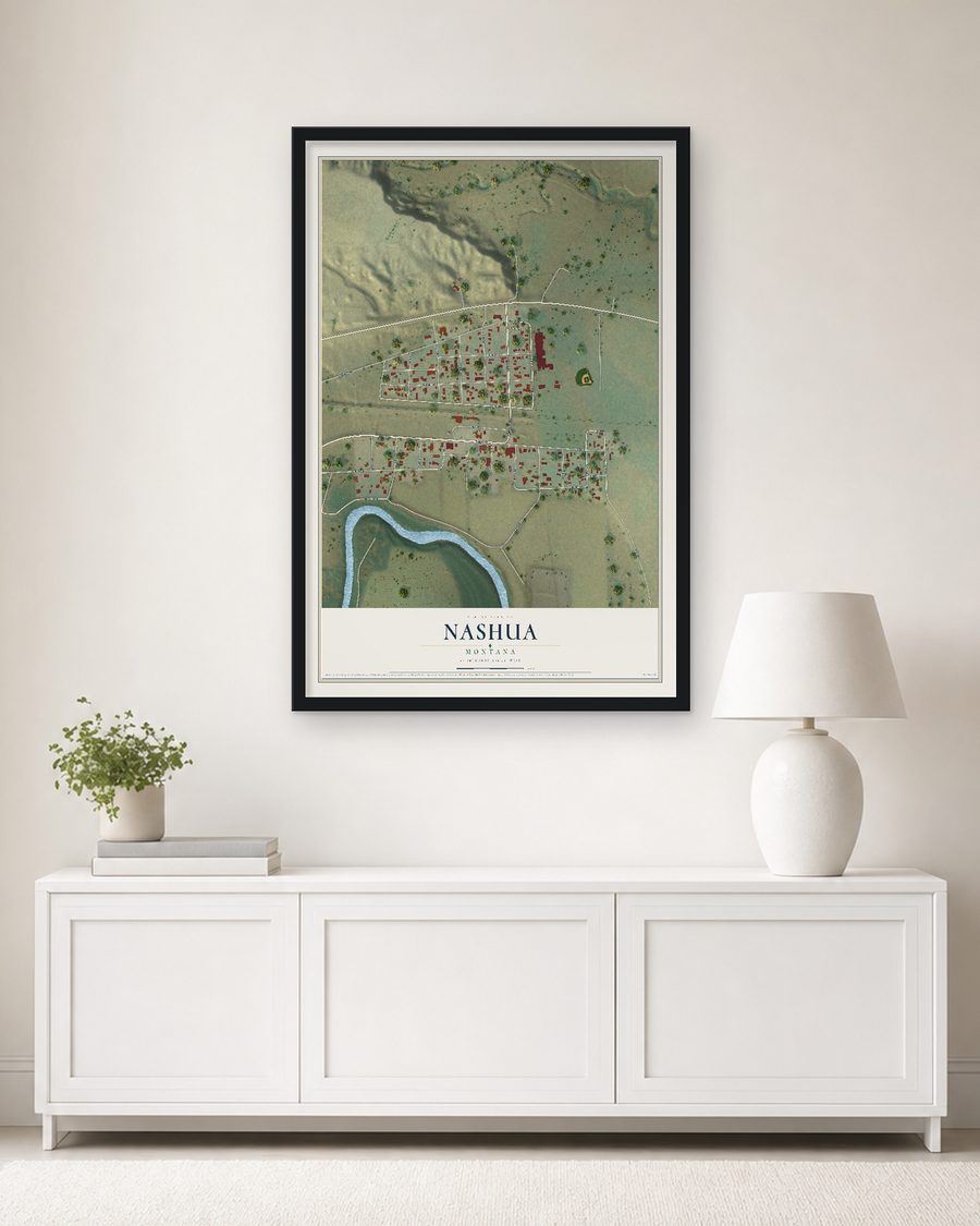 The Nashua, Montana map, 24 x 36 in, in a black wood frame on a living room wall