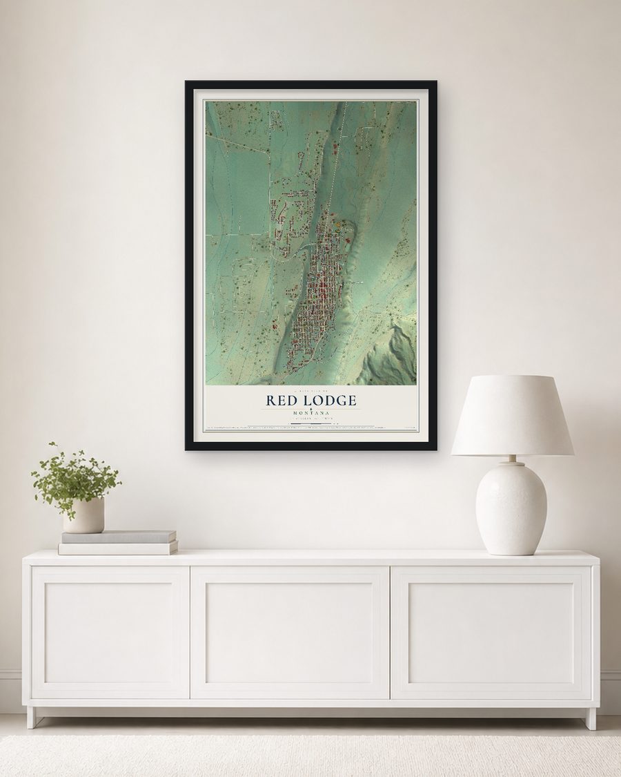 The Red Lodge, Montana map, 24 x 36 in, in a black wood frame on a living room wall