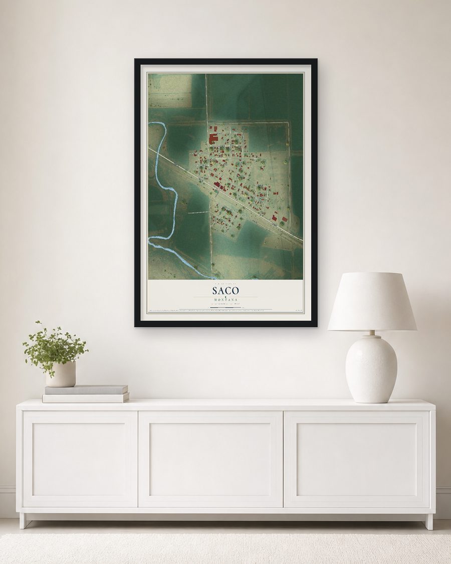 The Saco, Montana map, 24 x 36 in, in a black wood frame on a living room wall