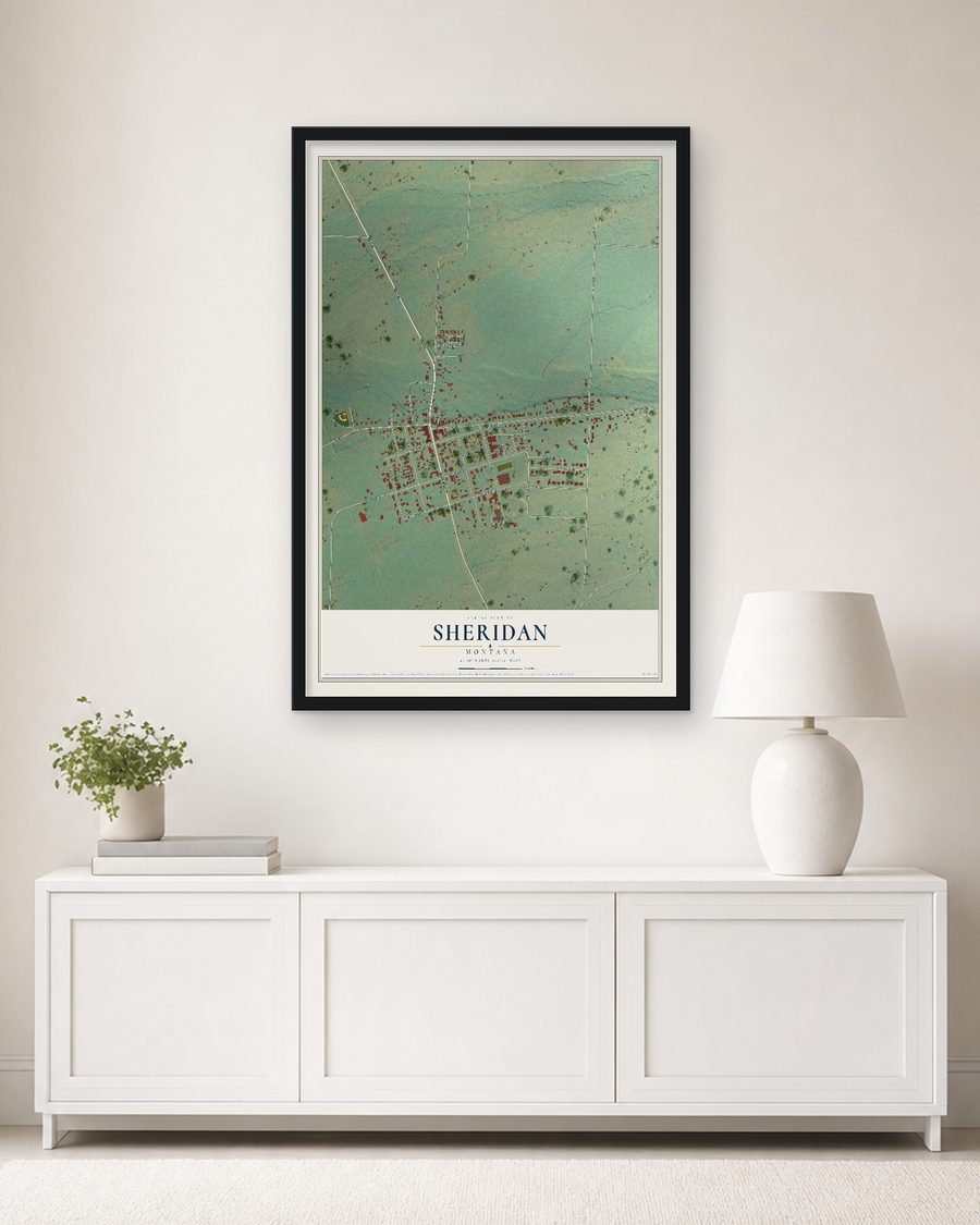 The Sheridan, Montana map, 24 x 36 in, in a black wood frame on a living room wall